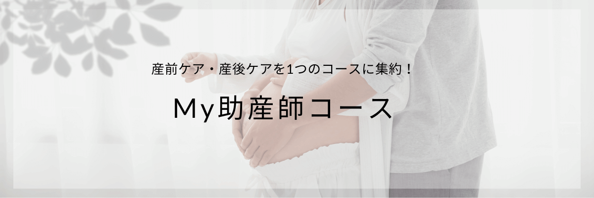 妊婦ママの大きなおなかにやさしく触れるパパ