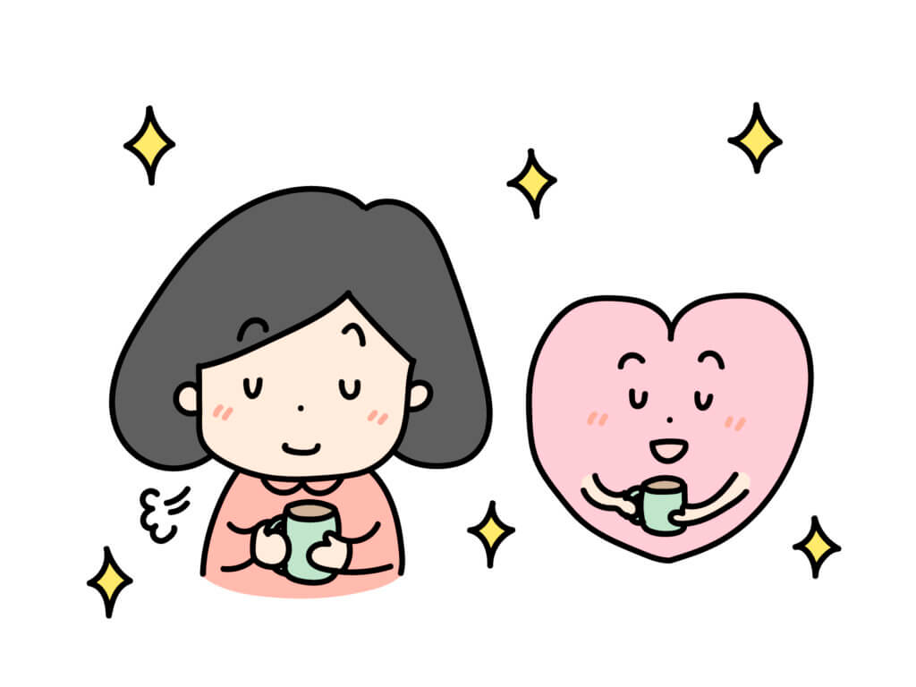 お茶をのんでほっとする女性