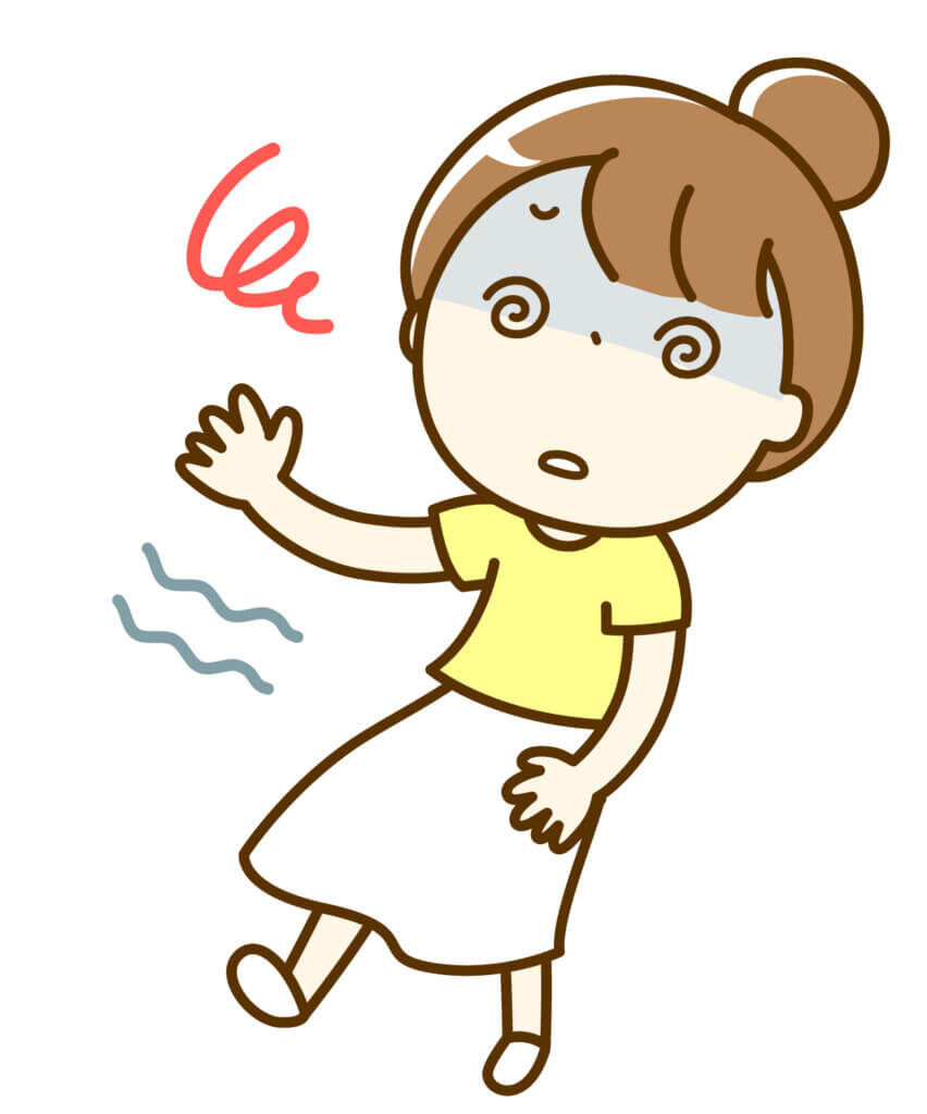 めまいを起こす女性